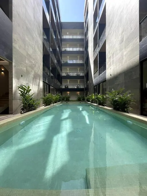 Modern Loft With Rooftop Pool & Steps From The Beach By Solmar Rentals Playa del Carmen Apartment